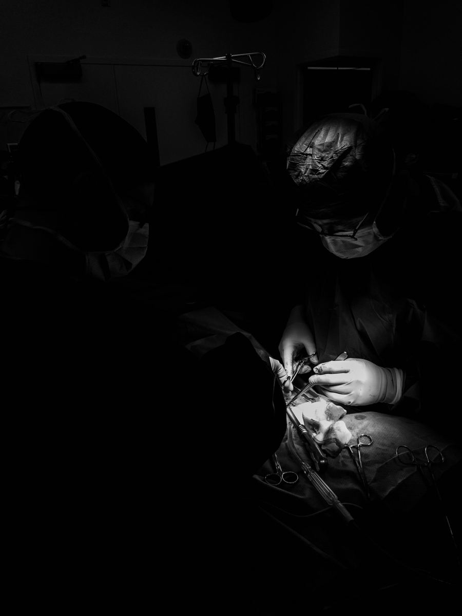 A surgeon at the table under the theatre light